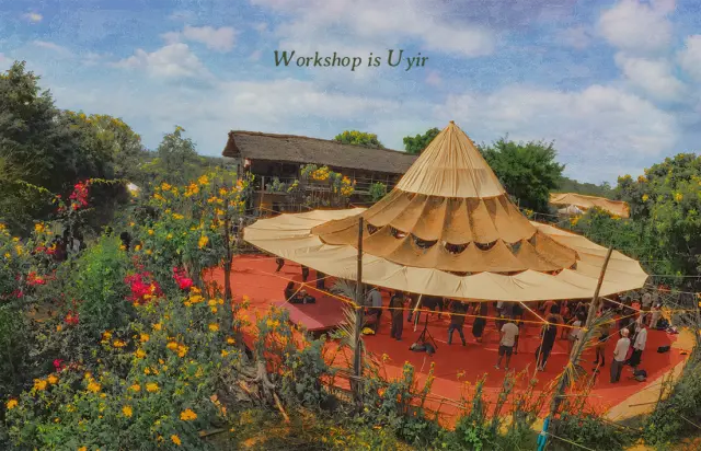 Workshop is Uyir. A domed workshop space among flowering plants.